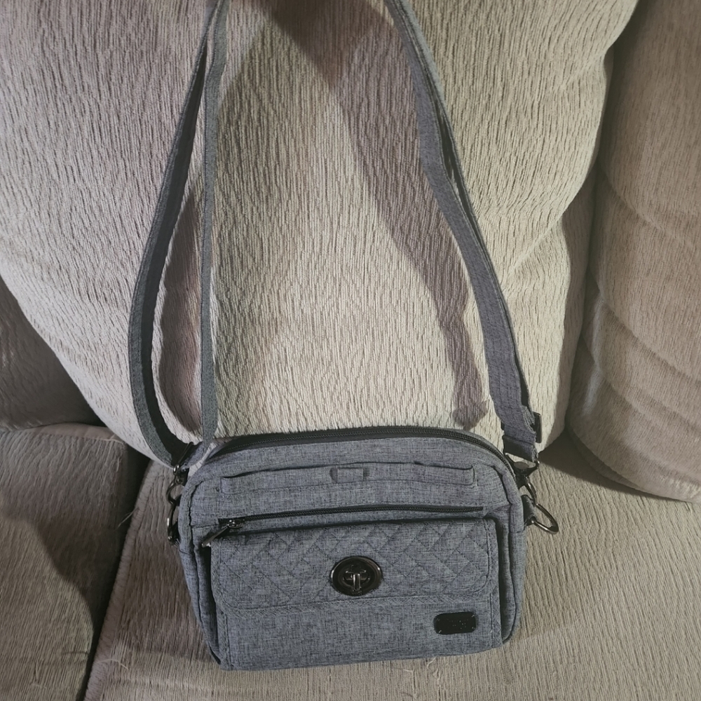Lug brand new (without tags) "Switch" convertible crossbody bag.